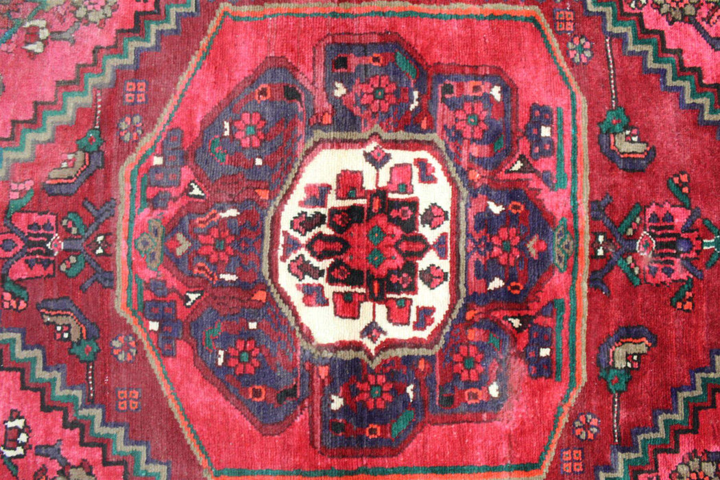 Charming Traditional Red Vintage Handmade Oriental wool rug medallion close-up www.homelooks.com