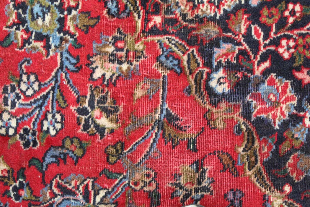 Classic Traditional Vintage Red Medallion Handmade Oriental Wool Rug floral design close-up www.homelooks.com