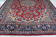 Close-up of traditional rug showing detailed patterns and rich color variations. homelooks.com