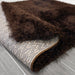 Lily Shimmer Brown Shaggy Rug folded www.homelooks.com