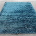 Lily Shimmer Turquoise Shaggy Rug over-view www.homelooks.com