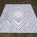 Luxy Geometric Rug on wooden floor www.homelooks.com