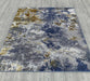 Ritz Abstract Modern Rug Gold & Blue (V1) on wooden floor www.homelooks.com