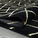 Ritz Geometric Contemporary Rug Gold & Black (V2) folded homelooks.com