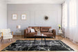 Ritz Marble Design Rug Gold & Black in living room homelooks.com