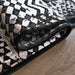 Elexus Ruby Abstract Design Rug - Black folded www.homelooks.com