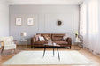 Lily Shimmer White Shaggy Rug in living room www.homelooks.com