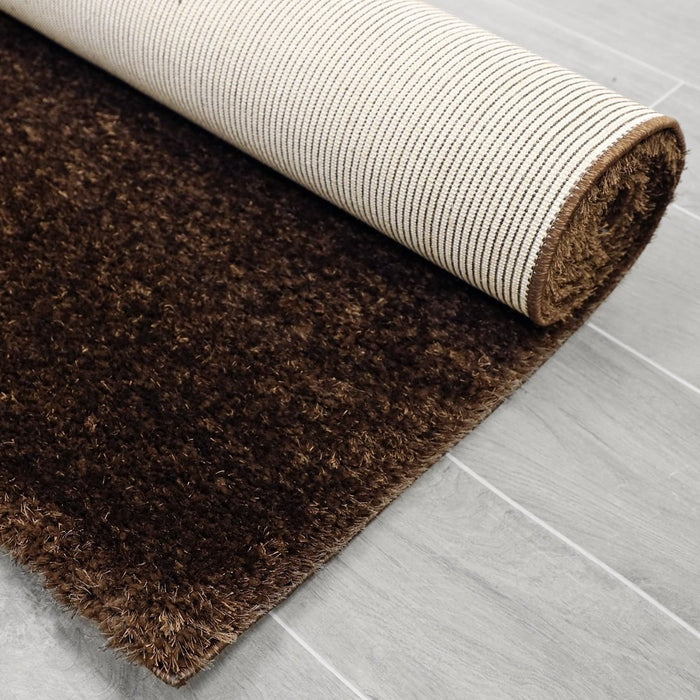 Puffy Shimmer Brown Shaggy Rug folded www.homelooks.com