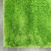 Puffy Shimmer Green Shaggy Rug corner view www.homelooks.com