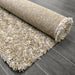 Puffy Shimmer Ivory Shaggy Rug folded www.homelooks.com
