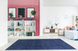 Puffy Shimmer Navy Shaggy Rug in living room www.homelooks.com