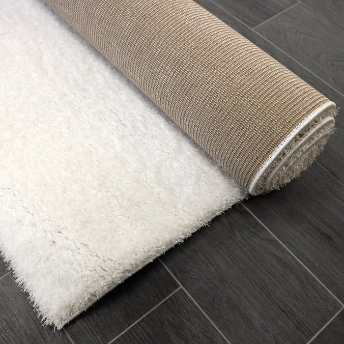 Puffy Shimmer White Shaggy Rug folded www.homelooks.com